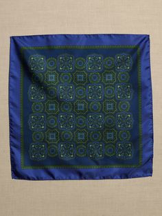 This refined pocket square is made from luxe silk for a pop of sheen color on your suit jacket.  Height: 13" (33cm) Width: 13" (33cm) Formal Rectangular Silk Scarf, Silk Pocket Square For Business, Elegant Blue Silk Pocket Square, Luxury Square Silk Scarf For Formal Events, Luxury Square Silk Scarf For Formal Occasions, Green Formal Pocket Square Handkerchief, Formal Green Pocket Square Handkerchief, Blue Rectangular Pocket Square For Formal Occasions, Elegant Blue Rectangular Handkerchiefs