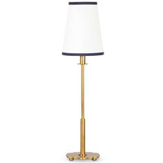 a lamp that is on top of a white tablecloth with a blue and gold base