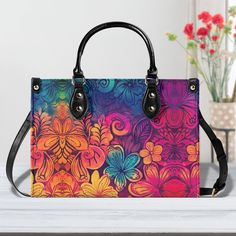 Tie Dye Hawaiian Flower Women PU Leather Handbag, Vegan Leather Strap Floral Bag, Cute Aesthetic Crossbody Hippie Travel Bag, Gift For Her * Available in 3 sizes: Small, Medium, and Large. See size chart in Photo's section. * Material: Polyurethane (PU) Leather * Sturdy top handles for comfortable carrying . * Removable and adjustable strap for different style look options. * Smooth Zipper closure to keep your belongings safe . * Inside pockets for convenient storage with some small things. * Great gifts for daughter, girlfriend, best friends, mom, etc. CARE INSTRUCTIONS: Wipe with cold water and a wet cloth. It's normal to smell something when you receive your new bag. You can open the bag and leave it for couple days to remove the smell. All of our items are made to order and we do not a Flower Women, Hawaiian Flower, Floral Bags, Hawaiian Flowers, Bag Cute, Cute Aesthetic, Friends Mom, Small Things, New Bag