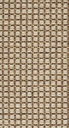 a close up view of woven material with brown and white stripes on the fabric,