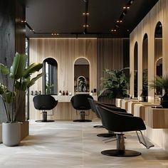 a salon with chairs and plants in it