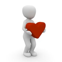 a person holding a red heart in his hands on a white background with clipping area for text