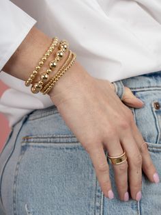 Add a touch of bubbly charm to your style with the Double Bubble Stretch Bracelet! Made with alternating 10mm and 6mm gold fill beads, this stretch bracelet is perfect for adding a playful twist to any outfit. Stretchy and easy to wear, it's a must-have for any jewelry lover. Classic Stackable Stretch Bracelet, Bubble Bracelet, Tennis Jewelry, Gold Bubbles, Initial Jewelry, Engraved Items, Religious Jewelry, Beads Jewelry, Gold Filled Jewelry