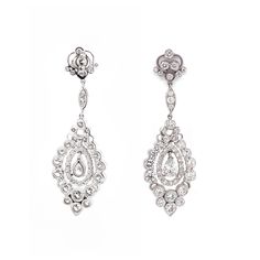 This dainty drop earrings holds center pear cut diamonds 1.12 carat total. Accented by round cut white diamonds 6.32 ct in total. Diamonds are natural in G-H Color Clarity VS. Platinum 950 metal. Butterfly studs. Floral inspired design. Width: 1.8 cm Height: 5.6 cm Weight: 22.6 g