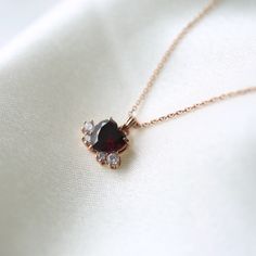 Garnet heart necklace 💝 * Details * Material : sterling silver with plate, 14k solid gold Color : Gold, white or rose gold Pendant Size : 11*8mm Heart stone : 7*7mm Round stone : 2.5mm, 1.7mm Chain Length : 16.5inch(If you want longer chain, please leave the length you need at the order note) We provide gift package with some our business card, Guarantee card, zip bag and caring tips card. Please check our shop policies and we love to hear from you about anything. Luxury Heart-shaped Rose Gold Necklace, Tarnish Resistant Heart Pendant Necklace For Her, Heart Pendant Necklace Tarnish Resistant As Gift For Her, Tarnish Resistant Heart Pendant Necklace As Gift For Her, Rose Gold Sterling Silver Double Heart Necklace, 14k Rose Gold Necklace With Heart Charm, Tarnish Resistant Rose Gold Heart Pendant Necklace, Luxury Red Heart Pendant Necklaces, Rose Gold Tarnish Resistant Heart Pendant Necklace