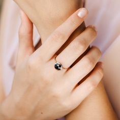 Black onyx 14K gold ring. A dainty, delicate black onyx gemstone ring, ideal for stacking for every woman who loves elegance. An excellent choice for anniversary gift or birthday gift for her. 100% handcrafted with love!D E T A I L S● Metal: 14K solid gold, 14K white gold or 14K rose gold● Gemstone: Black Onyx, briolette cut● Stone Diameter: 8mm (0.31in), 10mm (0.4in) and 12mm (0.5in) R I N G ∙ S I Z I N GFor General Reference:● we use standard US Ring Sizing● an average women's ring finger is s Minimalist Ring With Polished Round Stone, Black Birthstone Jewelry For Promise Ring, Minimalist Rings With Polished Round Stone, Black Birthstone Rings For Anniversary, Black Birthstone Rings, Gold Jewelry With Round Black Spinel, Gold Jewelry With Black Spinel, Black Birthstone Ring Gift, Black Birthstone Rings For Gifts