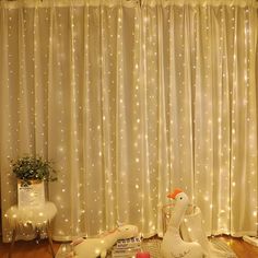 a living room filled with furniture and lights