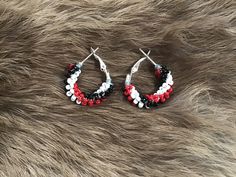 Authentic Beautiful Native American Indian Jewelry Navajo Zuni Hand Beaded 1 inch Hoop Earrings Great for a  Gift❤️ Handcrafted by Navajo Artist Harriet Crosby Present in virtually every Native American tribe, the feather symbol is universally recognized as a representation of trust, strength, wisdom, freedom, and honor. Incorporated into many sacred pieces of Native American wear, the feather is easily one of the most respected symbols. Southwestern Style Hoop Earrings As Gift, Southwestern Hoop Earrings For Gift, Handmade Southwestern Hoop Jewelry, Handmade Southwestern Style Hoop Jewelry, Southwestern Handmade Hoop Jewelry, Handmade Southwestern Small Hoop Jewelry, Handmade Small Hoop Southwestern Earrings, Feather Symbol, Feather Symbolism