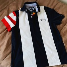 White Blue Hilfiger Blue Striped Polo Shirt For Summer, Blue Cotton Polo Shirt With Three Stripes, Blue Casual Polo Shirt With Three Stripes, Casual Blue Polo Shirt With Three Stripes, Tommy Hilfiger Navy Sporty Tops, Red Pajama Pants, Tommy Hilfiger Hoodie, Red Pajamas, Tommy Hilfiger Vintage