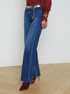 Fitted and flattering through the hips, the Scottie is our classic wide-leg jean. A contoured waistband sits securely at the natural waist without gaping. • Premium stretch denim• High-rise wide-leg • 5-pocket design• Front zip-fly and button closure• 32” inseam | L'AGENCE Scottie Wide-Leg Jean In Desoto Perfect Sneakers, High Rise Wide Leg Jeans, Knit Denim, Vintage Havana, Stylish Clothes For Women, Fall Skirts, Summer Skirts, Trina Turk, Black Print