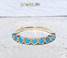 Don't miss this opportunity to own this beautiful gemstone ring crafted in 14k gold filled You can wear the rings as a set together or each ring by it self. => Gemstone Type - Turquoise Arizona => Gemstone Size - 2.5mm => Gemstone Cut - Faceted => Total Number of Gemstones - 9 => Metal Type - 14k Gold Filled (Tarnish Resistant And Nickel Free) - also available in 925 sterling silver * Please contact me for pricing on a sizes larger than 11 * ~ Feel free to ask me about custom made Adjustable 14k Gold Turquoise Jewelry, Adjustable Turquoise 14k Gold Jewelry, Gold Turquoise Ring For Anniversary, Turquoise Round Band Promise Ring, Turquoise 14k Gold Jewelry With Bezel Setting, Gold Stackable Turquoise Ring For Anniversary, Turquoise Round Band Ring For Anniversary, 14k Gold Turquoise Jewelry With Accent Stones, Stackable Blue Turquoise Ring In 14k Gold