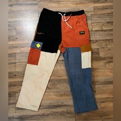 New With Tags Color Block Cotton Jeans For Streetwear, Multicolor Denim Pants With Pockets, Multicolor Cotton Jeans With Pockets, Multicolor Jeans With Pockets, Multicolor Straight Leg Pants For Streetwear, Casual Cotton Color Block Pants, Casual Color Block Cotton Jeans, Color Block Cotton Bottoms For Fall, Multicolor Cotton Pants For Fall