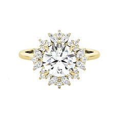 a yellow gold ring with an oval cut diamond surrounded by small round diamonds