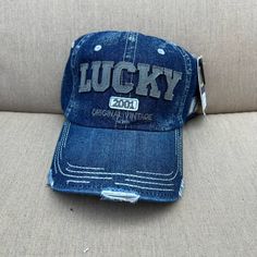 Trendy Denim Baseball Cap With Distressed Detail . Spring Blue Denim Baseball Cap, Trendy Blue Denim Baseball Cap, Casual Denim Baseball Cap For Spring, Casual Denim Blue Baseball Cap For Spring, Casual Medium Wash Denim Baseball Cap, Casual Distressed Blue Hat, Casual Blue Distressed Hat, Denim Cap, Denim Baseball Cap