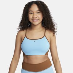 Soft, smooth and snug, our Indy Bra brings you style and comfort. Its stretchy ribbed fabric moves with you from one activity to the next, while thin straps and longer lines give you the coverage you need and the fresh look you want. Talk about the best of both worlds. Aquarius Blue, Girls Sports Bras, Nike Sports Bra, Fresh Look, Sport Girl, Ribbed Fabric, Talk About, Sports Bra, The Next