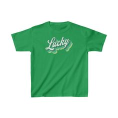 Say hello to our retro Kids Lucky Tee, made from durable heavy cotton that's perfect for everyday wear. Designed on Cape Cod and made in America, this retro style Lucky t-shirt is perfect for Cape Cod's St. Patrick's Day parade, or any time of the year. The fabric is 100% ethically grown and harvested in the US, guaranteeing a minimal environmental impact.Our commitment to sustainability extends beyond just materials – this tee is made using sustainable means of production and is certified by Oeko-Tex for safety and quality assurance. XS S M L XL Width 16.14" 16.93" 18.11" 18.90" 20.08" Length 20.47" 22.05" 23.62" 25.20" 26.38" Sleeve length 13.39" 14.17" 15.35" 16.14" 17.32" Retro Crew Neck T-shirt With Lettering, Green Cotton T-shirt With Logo Print, Vintage Short Sleeve T-shirt With Lettering, Retro Green T-shirt For Streetwear, Green Crew Neck T-shirt With Text Print, Retro Pre-shrunk Crew Neck T-shirt, Retro Crew Neck T-shirt Pre-shrunk, Basic Green T-shirt With Text Print, Retro Crew Neck T-shirt With Text Print