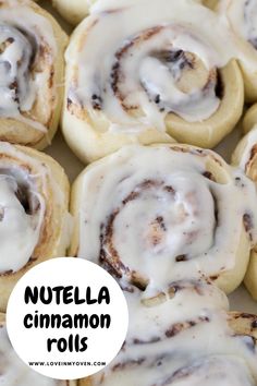 cinnamon rolls with white icing on top and the words nutella cinnamon rolls above them