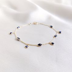 This stunning bracelet is set in 14k Solid Yellow Gold with Natural Blue Sapphire. It is an unique and dainty gemstone  bracelet for nearly every occasion and is completely hassle-free jewelry. ITEM DETAILS: * Gem: Blue Sapphire * Gem Size: 3mm (4pcs) * Gem Shape: Round cut * Gem Size: 3x5mm (5pcs) * Gem Shape: Oval cut * Gem Weight: 2.81 carats * Gold Purity: 14KT * Gold Weight: 1.14 gram * Total Weight of the Bracelet: 1.70 gram ✔️The Gold purity is guaranteed and it comes with authentic 14KT Yellow Gold Gemstone Bracelets For Party, Yellow Gold Gemstone Bracelet For Party, Party Jewelry With Gemstones In 14k Gold, Party Jewelry In 14k Gold With Gemstones, 14k Gold Gemstone Jewelry For Parties, Party 14k Gold Gemstone Jewelry, Elegant Sapphire Bracelets For Gift, Diamond Bracelet With Gemstone Accents As A Gift, Elegant Faceted Gold Bracelet Gift