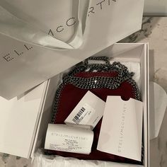 I Bought This Less Than A Year Ago. Used Once So It’s In Almost New Condition. I Say Almost Because In The Second Photo You Can See A Very Small Darker Circle, But It’s Difficult To See In Real Life. Bought Directly From Stella Mccartney Comes With Box , Bag, Dustbag , Tags Luxury Chain Bags As Gift, Luxury Chain Bag As Gift, Luxury Red Bag With Chain Detail, Luxury Shoulder Bag With Chain As Gift, Designer Shoulder Bag With Chain Strap As Gift, Stella Mccartney Falabella, Chain Bag, Box Bag, A Year Ago