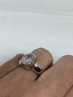 Vintage Engagement Ring clear CZ 925 Sterling Silver cocktail Sizes 6, 7, 8 Can be resized, my jeweler charges $10-$20 All rings are shipped free in the US in a nice gift box. Check out our over a THOUSAND great reviews Engraving is $4 per letter and is not always perfect depending on the piece. It can take a few days if the jeweler is busy. This is payable to Paypal Judithsltd@gmail.com Adjustable Vintage Engraved Nickel-free Ring, Antique Sterling Silver Hallmarked Diamond Ring, Vintage Adjustable Nickel-free Crystal Ring, Vintage Rainbow, Purple Art, Vintage Engagement, Vintage Engagement Rings, Cocktail Rings, 925 Sterling Silver Ring