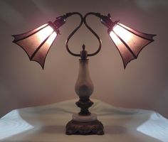 Antique Onyx Lamp 2 Light with
NYM Arts Tulip Fitter Shades in Light Amber Goth Lamp, Victorian Light Fixtures, Bridge Lamp, Vintage Lamp Shades, Gizmos And Gadgets, Purple Lighting, Antique Lamp Shades, Antique Aesthetic, Beautiful Hair Accessories