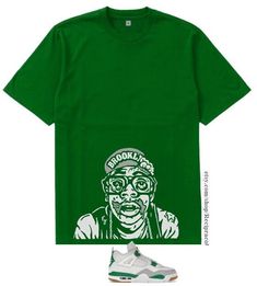 ... Brand new 100% cotton Green  6.oz shirt featuring a White  and Grey plastisol  screen print on the bottom of the shirt. A great shirt to complete your outfit and  match your air Jordan 4 Retro SB Pine Green sneakers. BODY LENGTH SMALL 26.562 MEDIUM 27.5 LARGE 29 XL 30.5 2XL 32 3XL 33.5 BODY WIDTH SMALL 18 MEDIUM 20 LARGE 22 XL 24 2XL 26 3XL 28 Pine Green Outfit Men, Green Shirt With Sublimation Print For Streetwear, Green Casual Shirt For Streetwear, Green Cotton Shirt For Streetwear, Casual Green Shirt For Streetwear, Streetwear Green Shirt With Front Print, Green Streetwear Shirt With Front Print, Green Shirt With Front Print For Streetwear, Green Front Print Shirt For Streetwear