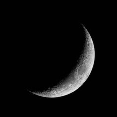 the moon is shown in black and white