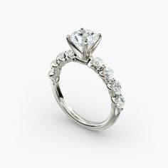 a diamond engagement ring on a white background