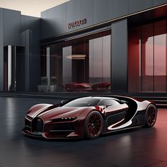 a red and black bugatti is parked in front of a building at night