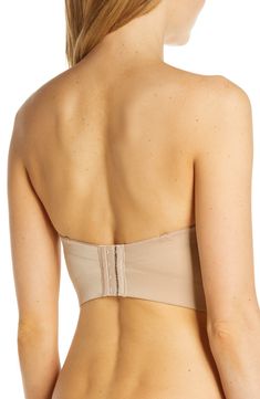 Create a flawless foundation with this smooth longline bra supported by hidden underwires, boning and molded cups. Transform it from strapless into a classic over-the-shoulder style, a halter, racerback or one-shoulder silhouette with the convertible straps. Removable, adjustable straps 76% nylon, 24% elastane Hand wash, dry flat Imported Lingerie Elegant Tube Top With Built-in Underwire Bra, Elegant Stretch Bra Friendly Tube Top, Elegant Stretch Tube Top, Bra-friendly, Elegant Tube Top With Adjustable Straps, Seamless Sculpting Strapless Shapewear, Elegant Stretch Tube Top With Removable Bra Pads, Strapless Seamless Shapewear, Fitted Tube Top With Medium Bust Support And Underwire, Fitted Tube Top With Padded Cups