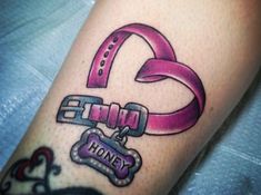 a tattoo on the leg of a person with a pink ribbon and dog tag that says, save honey