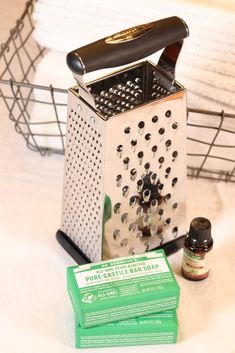 a grater sitting on top of a table next to some medicine