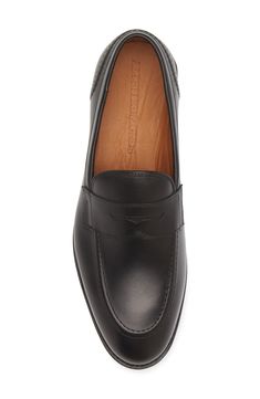 A streamlined silhouette and almond toe bring timeless sophistication to a leather loafer grounded by a cushioned footbed. Leather upper, lining and sole Made in the USA Classic Calf Leather Slip-ons For Office, Classic Calf Leather Almond Toe Slip-ons, Classic Calf Leather Slip-ons With Round Toe, Formal Calf Leather Slip-ons With Leather Footbed, Classic Calf Leather Slip-ons For Formal Wear, Classic Slip-ons With Leather Footbed For Business Casual, Classic Slip-on Dress Shoes With Almond Toe, Classic Slip-on Loafers With Branded Insole, Formal Almond Toe Slip-ons With Leather Footbed