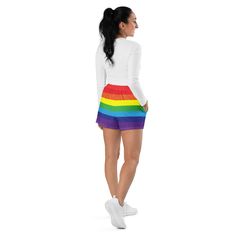 Add these cute striped rainbow shorts to your festival wardrobe. Not only super cool for pride events, they are also functional athletic shorts suitable for swimming, spending time on the beach or by the pool, gym workouts or outdoor leisure activities. You'll also appreciate the mesh pockets large enough to hold your phone. DETAILSComfortable elastic waistband with a flat white drawstringDeep mesh side-pocketsWater-repellent microfiber fabricMoisture wickingBreathable & fast dryingUPF50+ protectionMATERIAL91% recycled polyester, 9% spandex (composition may vary by up to 3%)Model wears size MHeight 5.5 feet (165 cm), waist circumference 29.1" (74 cm), hips 36.6" (93 cm) Playful Striped Summer Shorts, Playful Striped Shorts For Summer, Playful Shorts For Swimming, Playful Athletic Shorts With Built-in Liner, Playful Multicolor Sports Shorts, Playful Summer Workout Shorts, Playful Workout Shorts For Summer, Sporty Multicolor Athletic Shorts, Multicolor Rave Bottoms For Summer