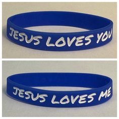 two blue bracelets with jesus loves you written on them