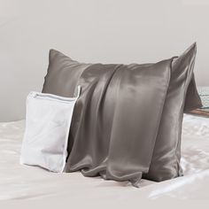 PRICES MAY VARY. Silk 【GOOD HOUSEKEEPING BEDDING AWARDS 2023-BEST VALUE 100% SILK PILLOWCASE】Rated smooth by sleep testers; Perfect moisture-wicking scores; Good assortment of sizes and configurations 【OEKO-TEX STANDARD 100 CERTIFIED】Promeed 23 Momme silk pillowcase is made with highest quality Organic Grade 6A+ Mulberry Silk, which is super soft, cooling, and non-absorbent making it ultra breathable, preventing breakouts and reducing sleep wrinkles. Our organic silk pillowcase contains powerful Fun Pillow Cases, Silk Pillow Case, Silk Pillowcase Hair, Silk Pillow Cover, Silk Bedding, Satin Pillowcase, Acne Free, Gray Silk, Prevent Acne