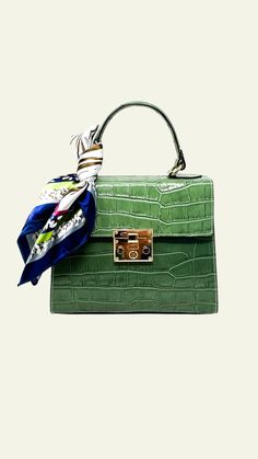 Structured Leather handbag with attached scarf and gold hardware. Croc Bag, Structured Handbags, Green Handbag, Aqua Green, Polished Look, Leather Handbag, Gold Hardware, Leather Handbags, Navy