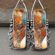 These Earrings Are A Retro Bohemian Style. They Are Geometric Shaped And Have A Dangle Design. They Are Very Stylish And Would Look Great With Any Outfit. 2.2 Inch X 0.55 Inch The Main Material: Alloy Ear Needle Material: Iron Plating: Other Mosaic Material: Resin Style: Boho Retro Bohemian, Estilo Boho Chic, Traje Casual, Artisan Earrings, Geometric Pendant, Bohemian Earrings, Fashion Jewelry Earrings, Estilo Boho, Rhinestone Earrings