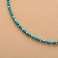 This handmade Turquoise and Gold Bead Boho Choker Necklace is a stunning and powerful combination. Turquoise is a blue-greenstone associated with the Throat Chakra, which is the center of communication and expression. It helps to open up the throat, allowing us to express ourselves honestly and authentically. The benefits of wearing this necklace include enhanced communication and expression, improved spiritual connection, balanced energy, and enhanced connection to the divine. It is a beautiful Blue Turquoise Necklace With Polished Beads As Gift, Spiritual Turquoise Beaded Necklace With Spacer Beads, Turquoise Necklace With Polished Beads As Gift, Gift Turquoise Necklace With Polished Beads, Gift-ready Polished Turquoise Bead Necklace, Blue Turquoise Necklace With Spacer Beads As Gift, Hand-strung Turquoise Necklace As Gift, Turquoise Beaded Necklace For Gift, Turquoise Beaded Necklace For Gifts