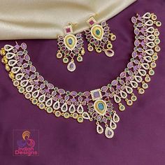 Elegant and exclusive South Indian style matte finish gold necklace studded with Ruby emerald and clear stones.  Please note that its matte gold tone! Stone Necklace Designs, Kemp Necklace, South Indian Style, Choker Necklace Designs, Ruby Emerald, Gold Choker Necklace, Cz Jewelry, Gold Choker, Wedding Jewellery Necklace