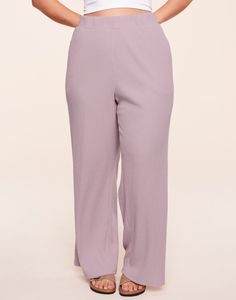 The coziest, most cuddly lounge pants you've ever worn! These wide leg pants are made of a plush rib knit in a beautiful purple hue. They have an elastic waistband and inset side pockets, and they'll quickly become your go-to pants for lazy Sundays (available in 1X-4X). Purple Stretch Bottoms For Loungewear, Wide Leg Ribbed Pants For Lounging, Comfortable Ribbed Pants, Solid Color Bottoms With Soft Texture For Loungewear, Casual Purple Bottoms For Lounging, Solid Color Soft Texture Bottoms For Loungewear, Wide Leg Pants With Ribbed Waistband For Relaxation, Solid Color Soft Texture Pants For Loungewear, Solid Color Soft Texture Loungewear Bottoms