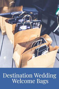 three brown paper bags filled with wedding welcome bags