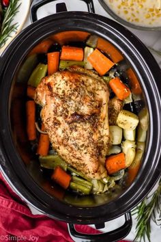 chicken and vegetables in a slow cooker