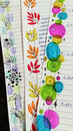 two notebooks decorated with colorful flowers and writing on lined paper next to each other