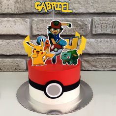 a pokemon themed birthday cake on a table