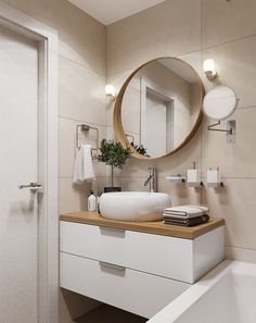 a bathroom with a sink, mirror and bathtub