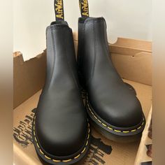 2976 Nappa Leather Chelsea Dr Martens Boots In Black Size 9 In Women’s Us Size 8 In Men’s Us Brand New, Never Used/Worn There Is A Slight Crease In The Back Of The Boot But That Is From Storage Retails For $170 Open To All Bundles And Offers! Comes From A Smoke, Mold And Pet Free Home Black Chelsea Boots With Steel Toe And Round Shape, Black Chelsea Boots With Steel Toe And Round Toe, Black Steel Toe Workwear Boots, Black Work Boots With Rubber Heel Cap, Black Slip-on Boots With Reinforced Toe, Black Leather Slip-on Work Boots, Black Slip-on Leather Work Boots, Black Closed Toe Boots With Leather Lining, Black Slip-on Boots With Leather Lining