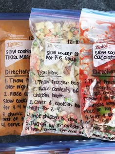 three bags of frozen food sitting on top of a counter