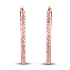 Dynamic tubes are embellished with stylish diamond-cut patterns in these striking women's hoop earrings. Fashioned in 14K rose gold, the earrings secure in place with hinged backs. Luxury Long Drop Rose Gold Earrings, Elegant Hammered Rose Gold Hoop Earrings, Luxury Elegant Rose Gold Linear Earrings, Luxury Rose Gold Diamond Hoop Earrings, Luxury Rose Gold Drop Linear Earrings, Gift Rose Gold 14k Gold-filled Hoop Earrings, Tube Hoop Earrings, Jared The Galleria Of Jewelry, Diamond Cut