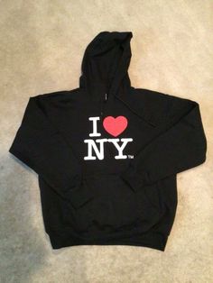 I Love NY Officially Licensed Unisex Black Hoodie - Size Large - New/NWT Hoodie from I Love NY Unisex fit (size large) Pockets in front 60% Cotton 40% Polyester Please see my other items for more men's and women's clothing. Shipping will be combined if you win more than one item! I Heart New York Sweater, I Love New York Sweater, Ny Hoodie, 2000s Fashion Trends, I Love Nyc, I Love Ny, 2000s Fashion, Dream Clothes, Cute Casual Outfits